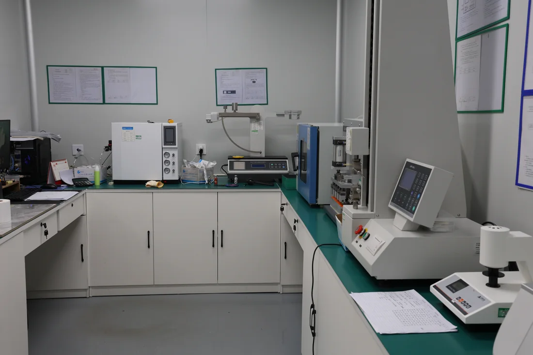 Material testing instruments on benches at a partner manufacturing facility